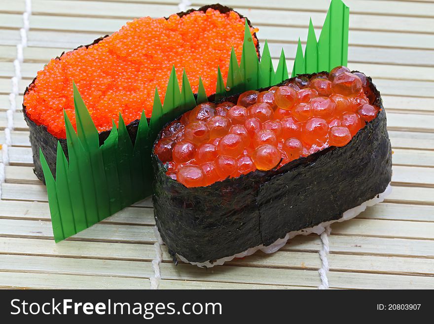 Closeup of salmon egg and red caviar sushi