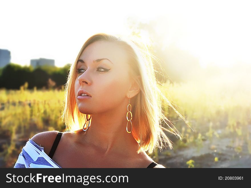 Attractive Young Girl In Beautiful Sunshine