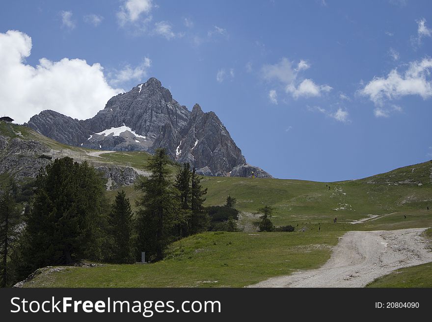 Beautiful landscape of mountains with footpath in Italian Alps