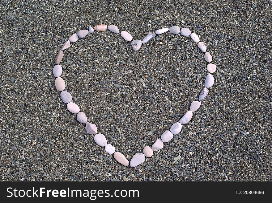 Heart from stones on the beach