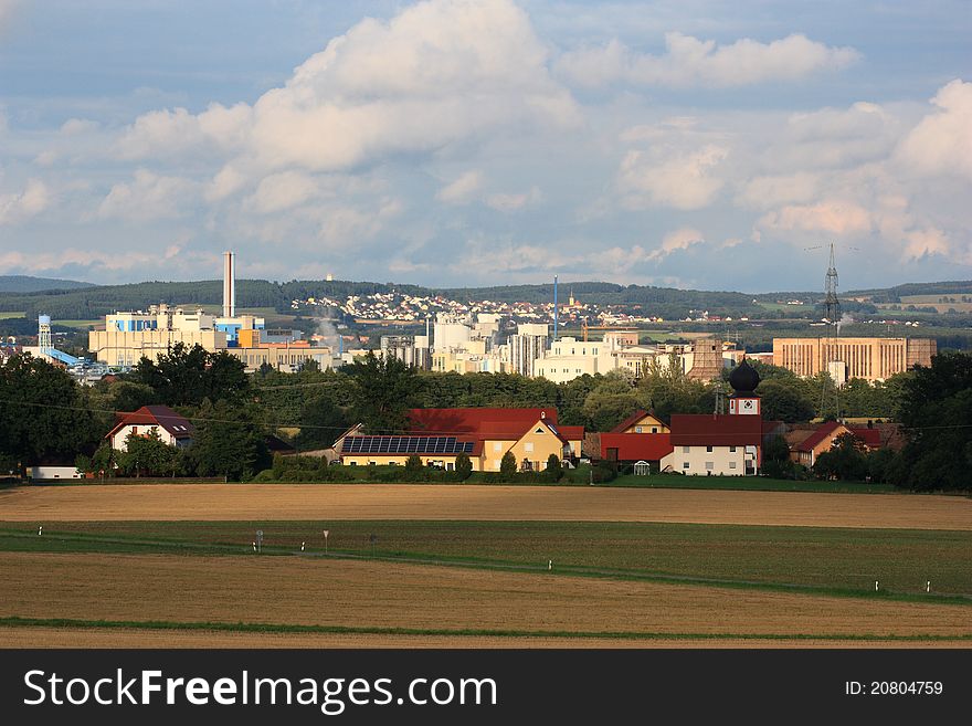 Grassland with the city schwandorf in the background