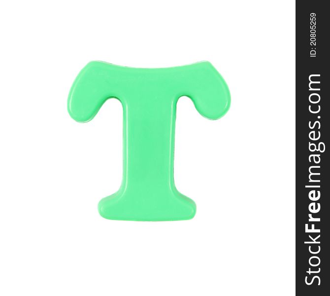 Plastic green letter T on a white background
