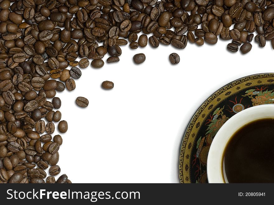 Coffee cup and grain on white background