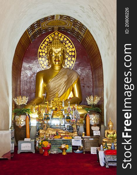 Golden buddha in arch, northern Thailand. Golden buddha in arch, northern Thailand.