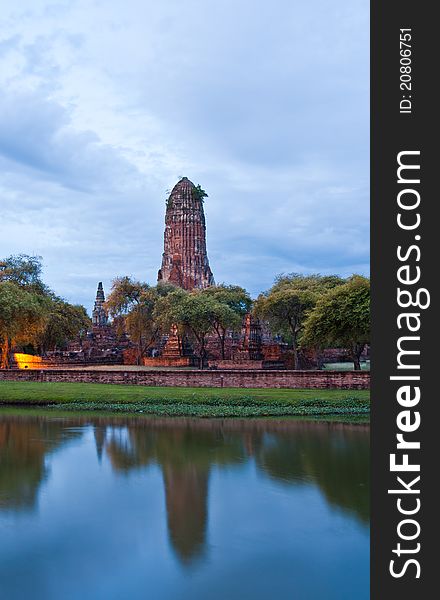 Ruin temple in Ayutthaya Thailand in twilight time with reflection in lake horizontal. Ruin temple in Ayutthaya Thailand in twilight time with reflection in lake horizontal