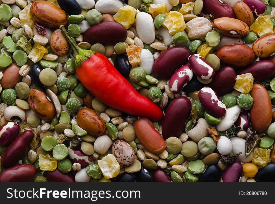 Variety of dried beans for soup with hot red pepper. Variety of dried beans for soup with hot red pepper