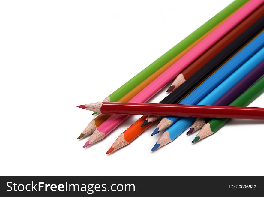 Isolated coloured pencils on a white background