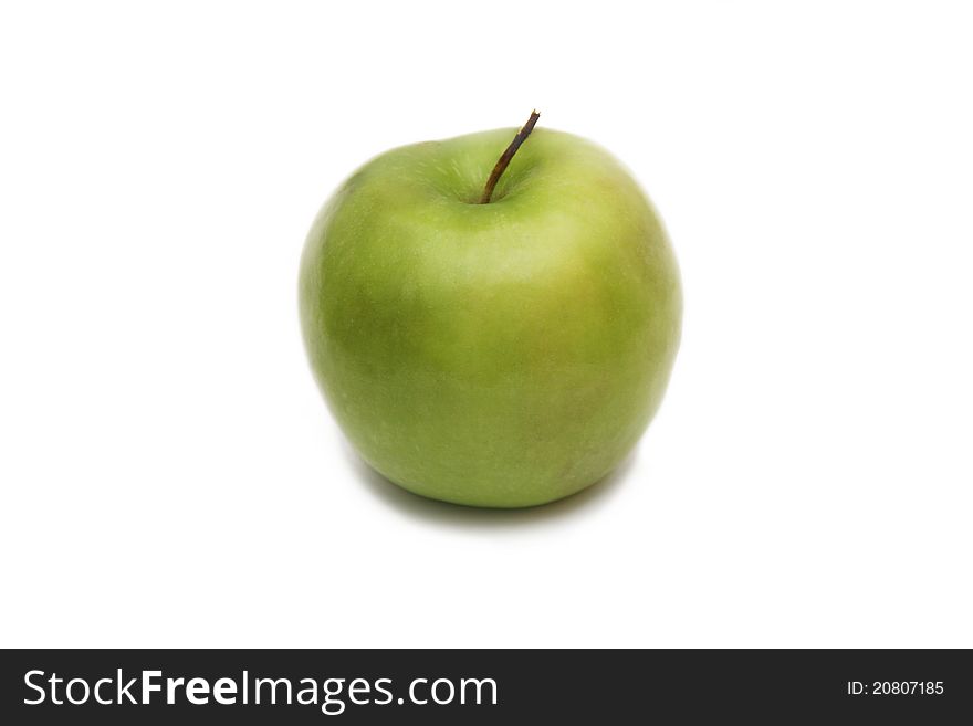 Isolated green apple on a white background