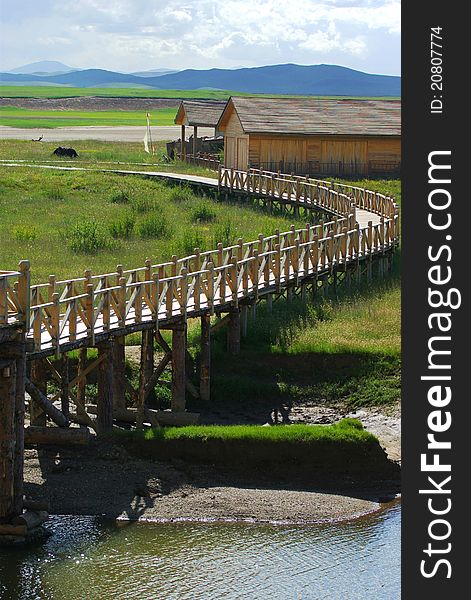 Wood corridor crossing the river