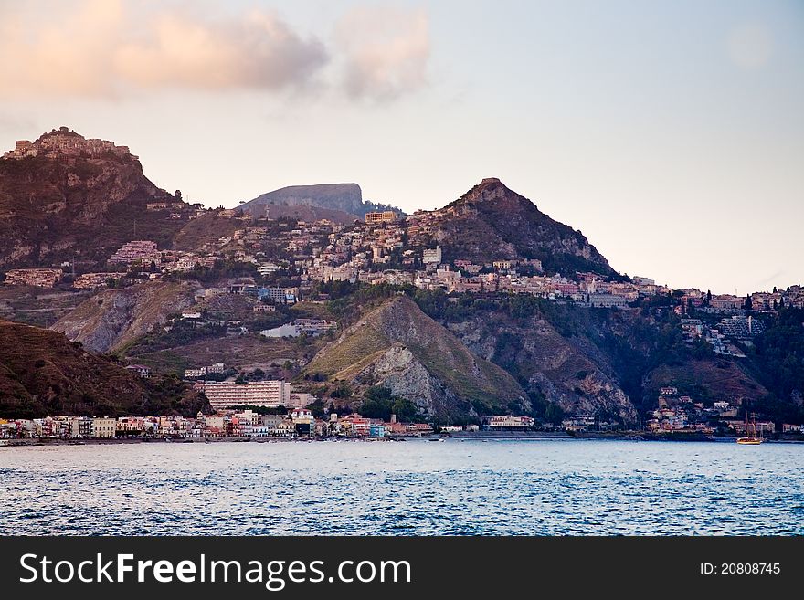Sicilian town Taormina on sunset