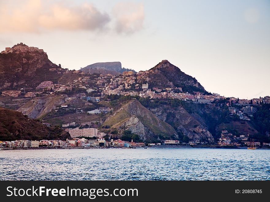 Sicilian town Taormina on sunset