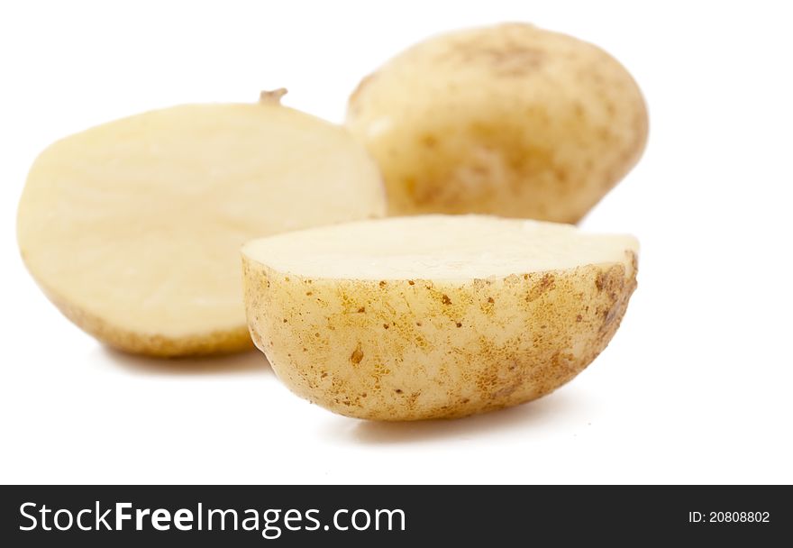 Raw potato on a white background