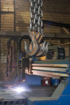 Metal Cutter And Lifting Hooks Royalty Free Stock Photography Metal Cutter And Lifting Hooks Royalty Free Stock Photography