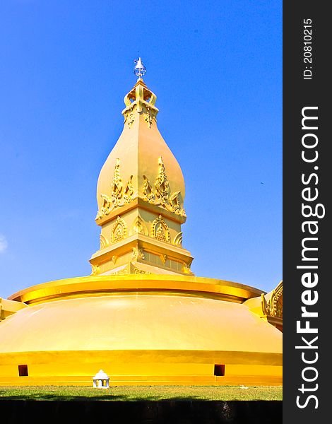 Golden Pagoda With Blue Sky At Side View