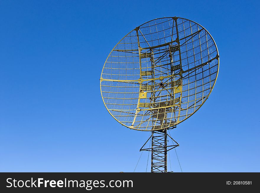 Military radar station against the clear blue sky