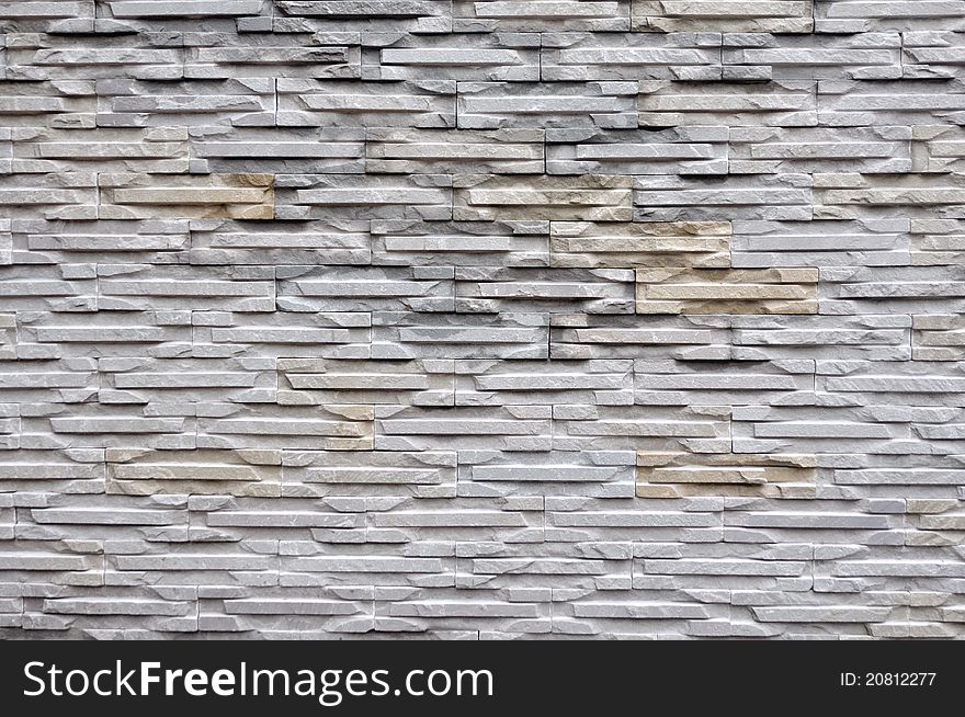 Stone wall background (decorated in garden).