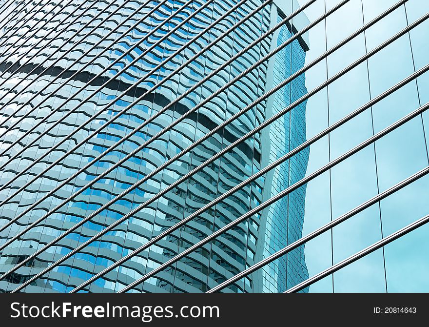 Modern Building Windows and reflected on another building