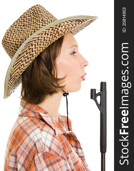 Cowboy woman with a gun on a white background. Cowboy woman with a gun on a white background.