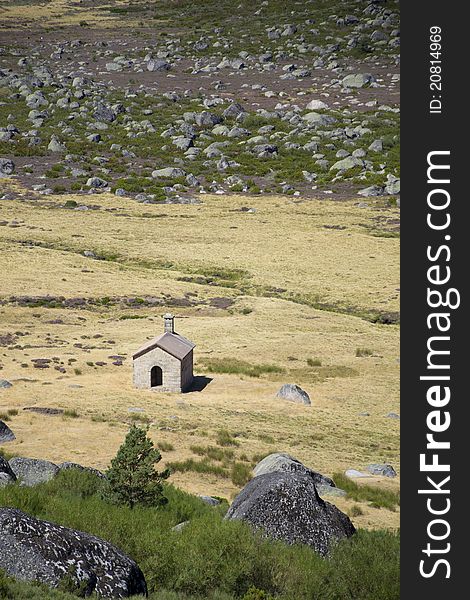 A little cabin stands alone in the immensity of the Estrela mountain, Portugal. A little cabin stands alone in the immensity of the Estrela mountain, Portugal