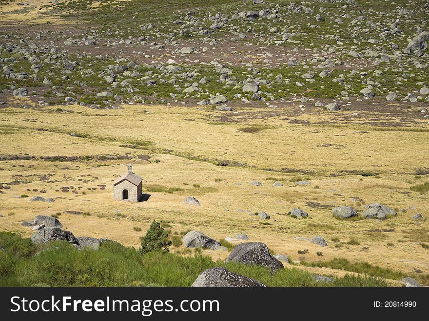 A little cabin stands alone in the immensity of the Estrela mountain, Portugal. A little cabin stands alone in the immensity of the Estrela mountain, Portugal