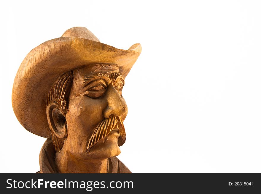 Old cowboy wood carved isolated