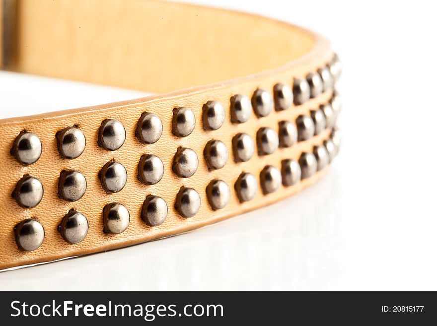 Leather belt decorated with metal beads. Leather belt decorated with metal beads