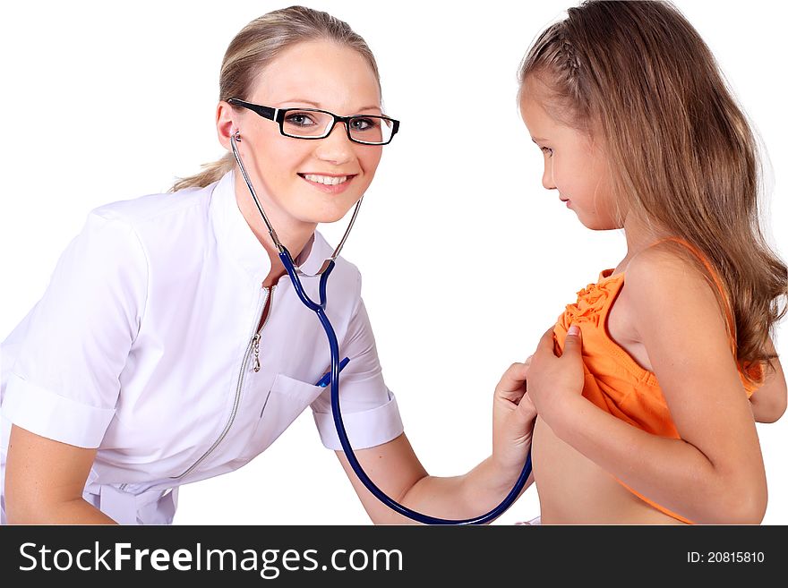 Young female doctor doing medical examination to a child