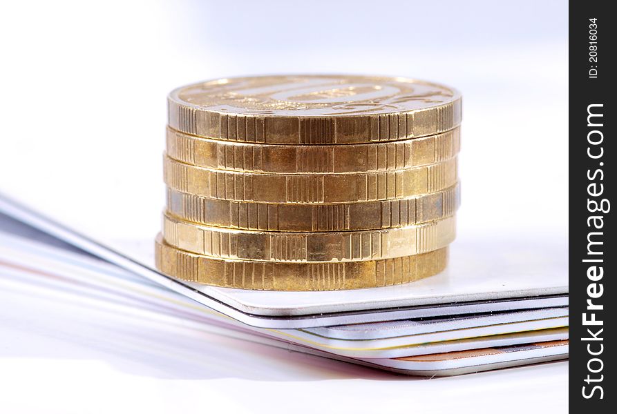 Color photo of a credit card and coins