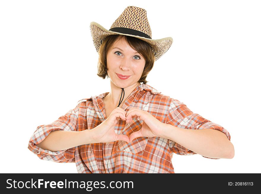 Cowboy woman doing a heart with her hands on a white background. Cowboy woman doing a heart with her hands on a white background.