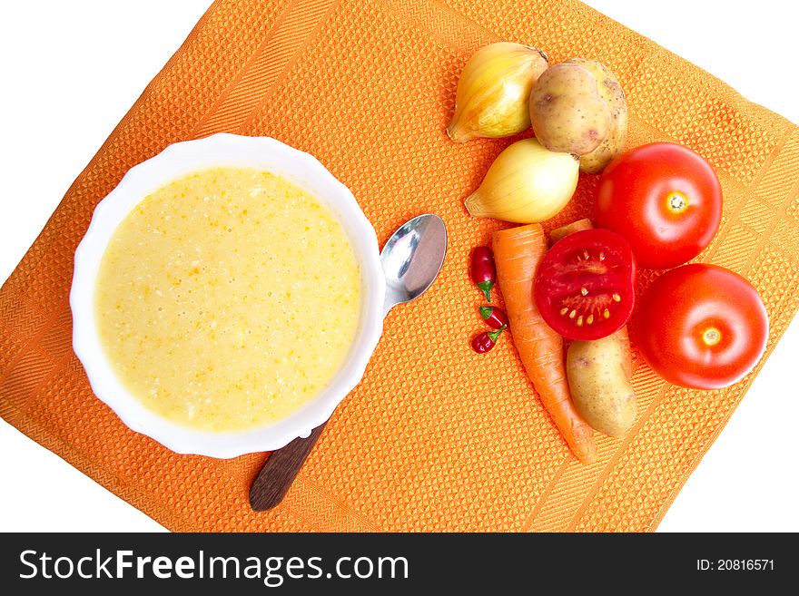 Soup pureed vegetables on orange napkin