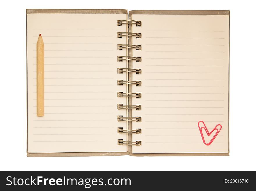 Blank notepad with pencil and paperclip