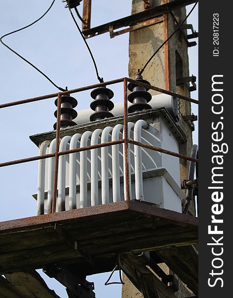 Electrical power transformator mounted on pillar. Electrical power transformator mounted on pillar