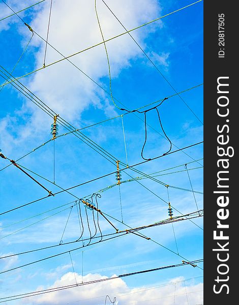 Catenary in winter at the station with blue sky