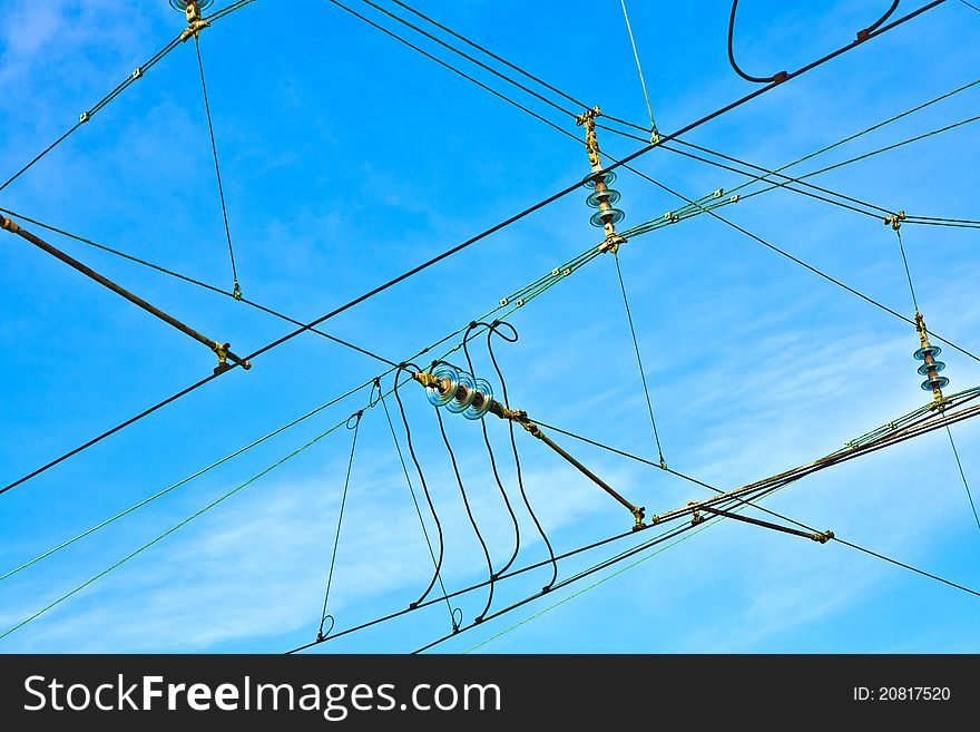 Catenary in winter at the station with blue sky