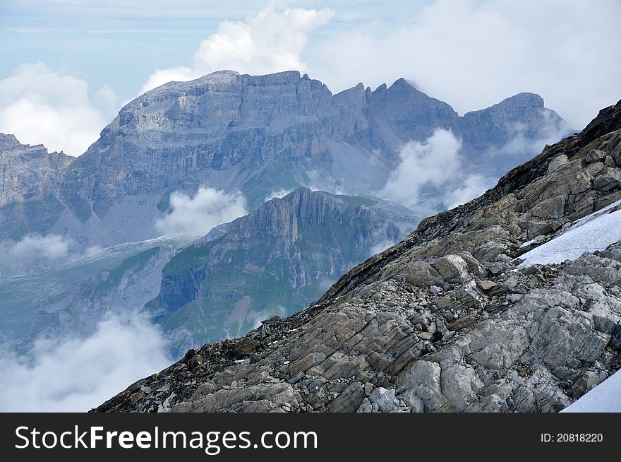 The layers of different types of stones in the picture can say a lot about the history of Alps