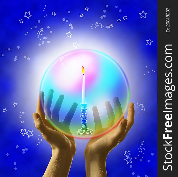 Hands holding a bright soap bubble with a lit candle inside