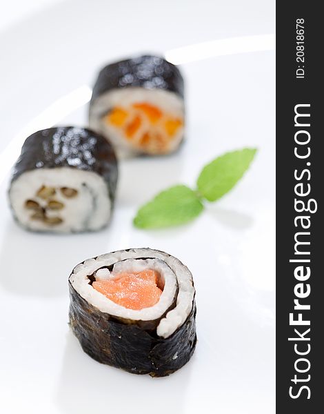 Sushi pieces on a white background