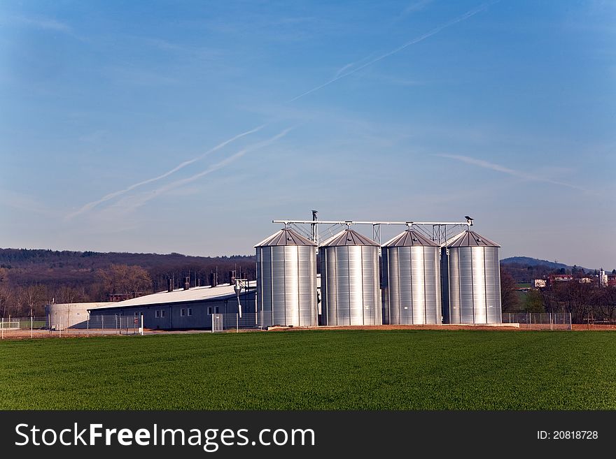 Silo and acre in beautiful light with clear sky. Silo and acre in beautiful light with clear sky