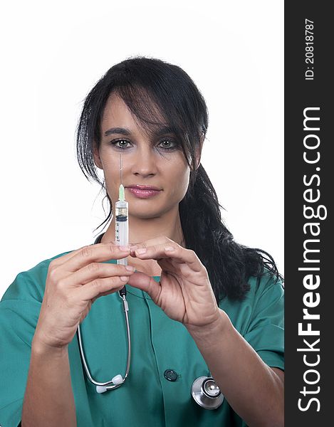 Beautiful nurse with syringe on white background