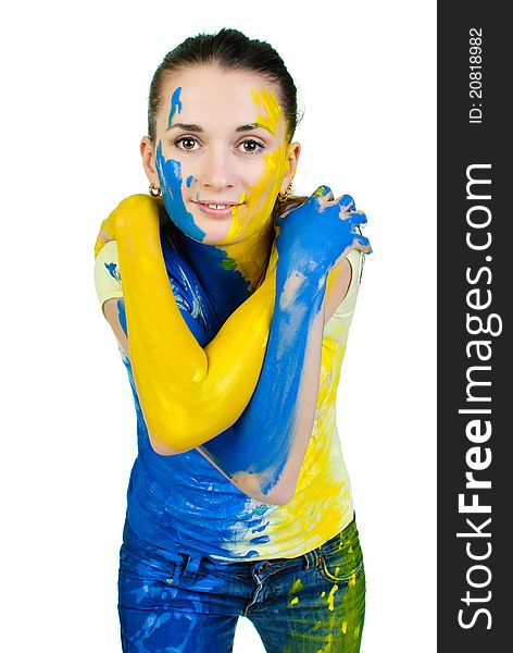 Young woman covered with paint looking at camera. Young woman covered with paint looking at camera