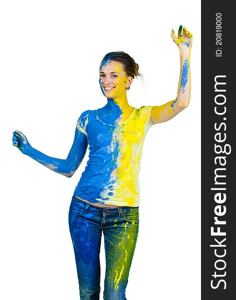 Young woman covered with paint looking at camera. Young woman covered with paint looking at camera