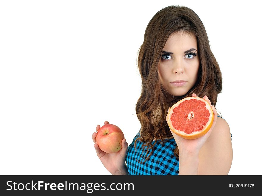 Young cute woman in blue dress with fresh fruit. Young cute woman in blue dress with fresh fruit