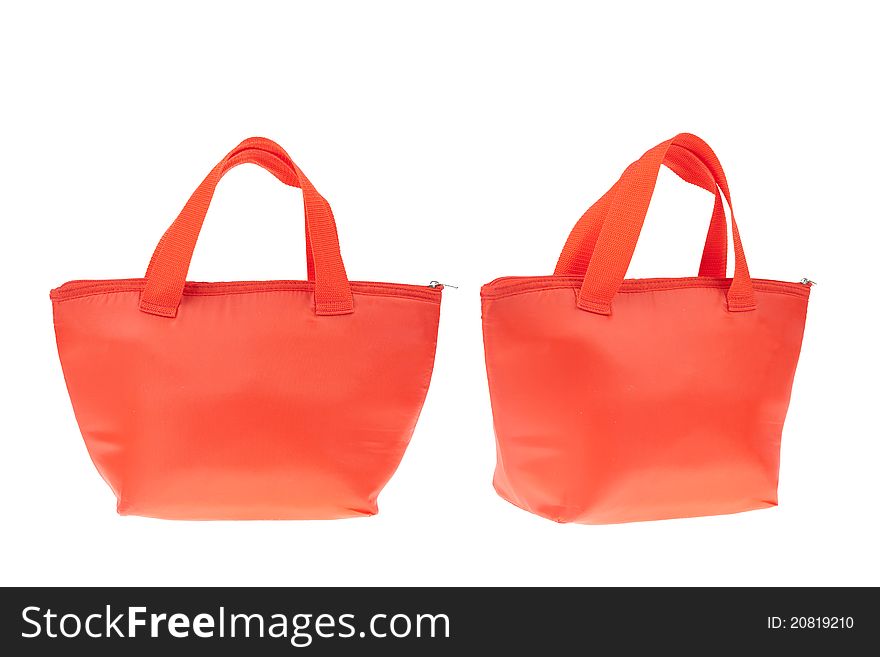 Colorful red cotton bag on white isolated background.