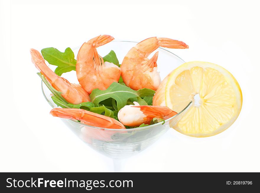 Fresh prawns in a cocktail glass with lemon. Fresh prawns in a cocktail glass with lemon