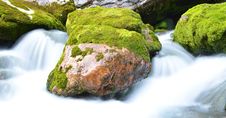Rock In A Stream Of Water Royalty Free Stock Image Rock In A Stream Of Water Royalty Free Stock Image