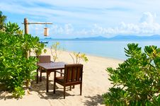 Chairs And Table On Beach Near The Sea Royalty Free Stock Photos Chairs And Table On Beach Near The Sea Royalty Free Stock Photos
