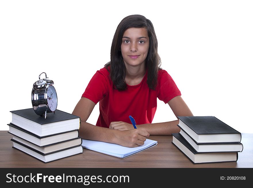 Teenage girl studying on her desk with a white background