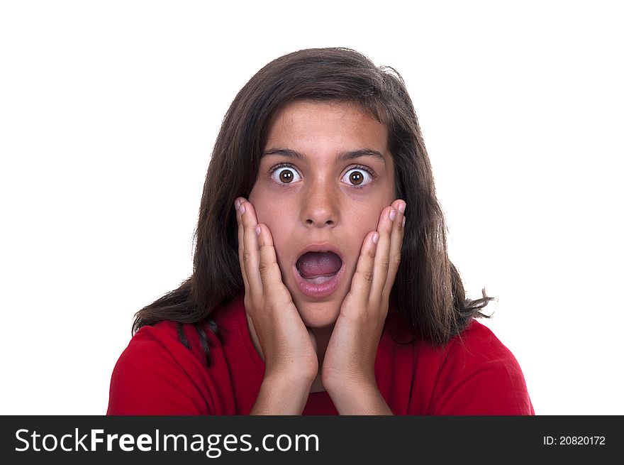 Brunette teen girl afraid on a white background