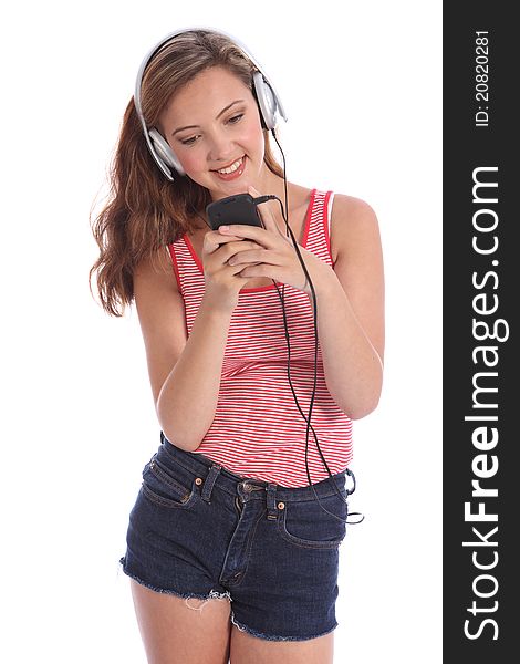 Happy beautiful teenage girl music on headphones