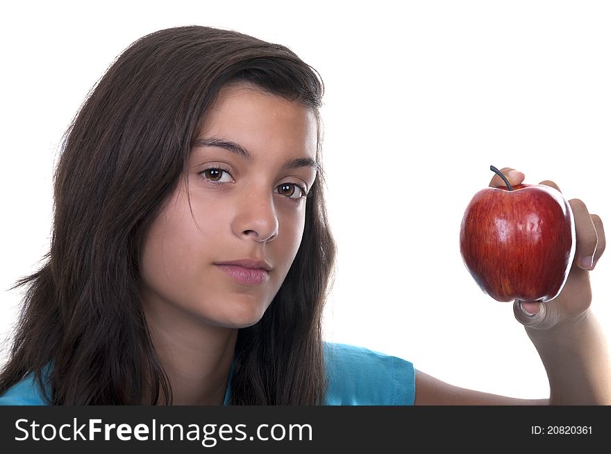 Teenage girl with red apple on white background